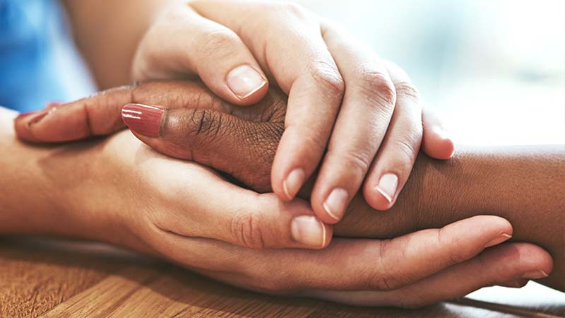 Close-up of Hands Embracing