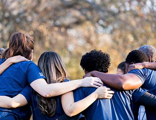 A Group of Young People Embracing